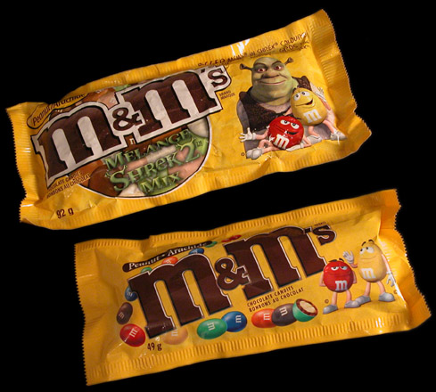 I eat m&m's chocolates inside the movie house - I eat m&m's chocolates inside the movie house.