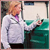 Litter - a woman disposing her litter properly