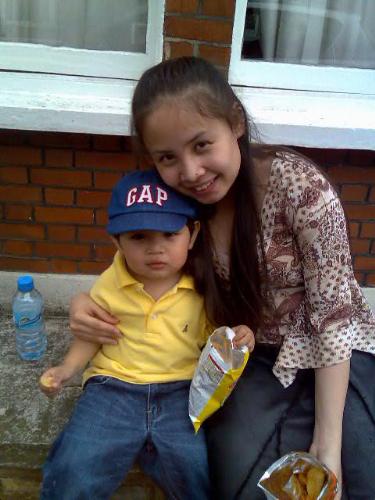 Me & my Son Julius - This was taken after we attended the worship service. We were waiting for my mom so we took picture .. lol ^_^