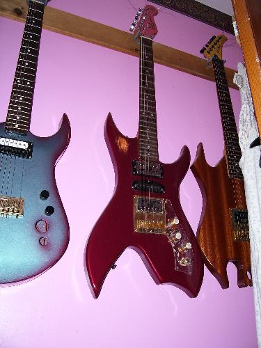 bc rich phantom - hand built by myself, this copy sports 2 humbuckers and a single wound pickup, clear pickguard, and it just screams'play' me