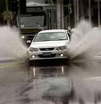 A car in the rain - A motorist driving in heavy rain