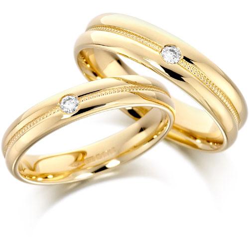 Rings. - Gold rings with a small diamond.