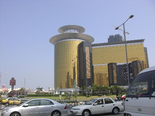 modern part of Macao -  This picture shows the modern part of Macao.The building is one of the biggest casinos which named Jinsha.This part is so much different from the ancient part of Macao.There is no the ancient trail there.Standing in this place,you hardly imagine the view of those poor buildings.It seems that they are in two quite different worlds.