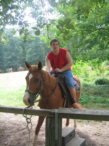 Having Fun Horseback Riding! - I like horses they are fun to ride.