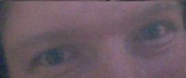 My eyes - A picture of how my eyes appear two different colors when they are really grey hazel but very reflective.