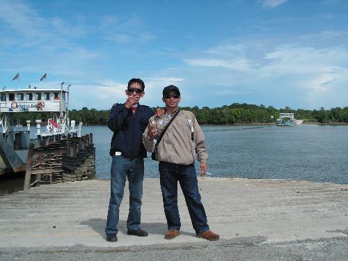 adventure - two staff from giatmara on the way to kampung serdeng.