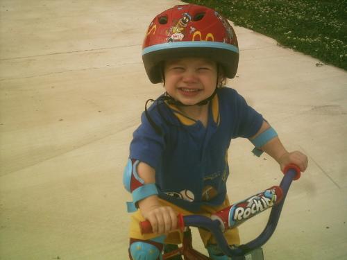 My son on his bike - My son smiling about his bike. 