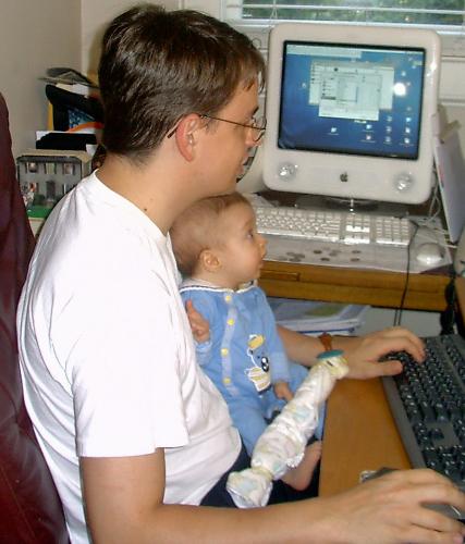 Daddy and Little Monkey - Hubby was showing Llittle Monkey how to use a computer. Daddy and Little Monkey - Hubby was showing Llittle Monkey how to use a computer.