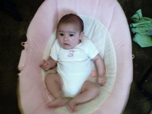 babygirl - zoey sitting in her bouncer lookin all cute.