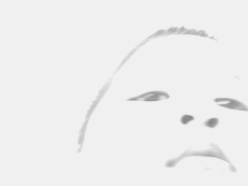 face - this is my sons face. he took it himself, i do not know how he did it. i guess he had used the camera on a direct sunlight and put it in black and white mode.