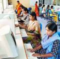Working women in night shift - Photo showing the womens working in night shift for BPO comany in night shift. Working women in night shift - Photo showing the womens working in night shift for BPO comany in night shift.