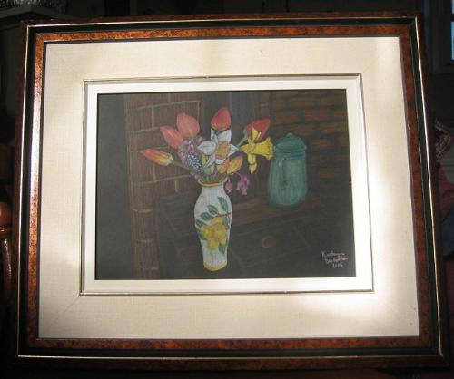Still life  - Colored pencil still life on black artists paper. The subject is a vase of flowers from my garden placed upon my wood stove.