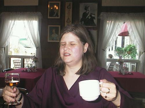 Me! - Here I am at Sunset Villa, with a cup of coffee in one hand, and a shot of Grand Marnier in the other hand. Yummy!