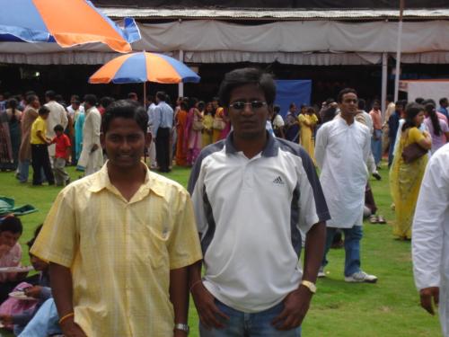 Me and by brother - Hi this photo is taken in ganesh puja in banglore. Actually every year the Oriya association arranges this puja in the palace ground of Banglore.
