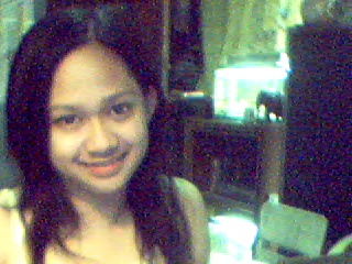 Webcam Shot - Shot a home using our old webcam. You can even see out aquarium and projection TV in the background.