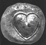 cyrene coin-silphium heart shaped seed pod - Ancient silver coin from Cyrene depicting a silphium seed or fruit.