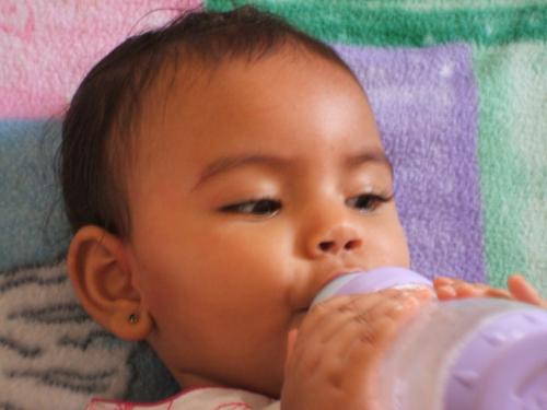 Jordyn - Jordyn holding her bottle for the first time.