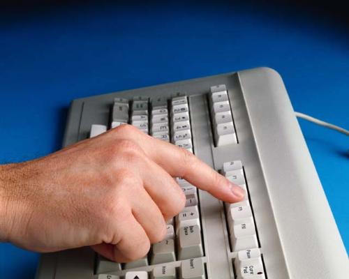 Computer Keyboard - This photo is of a keyboard where a writer might sit and write...the convenience of a computer makes the challenges of writing much easier than the old typewriters...