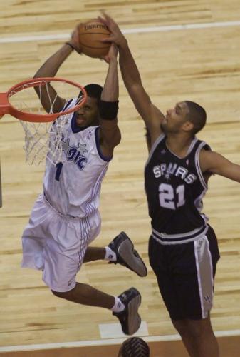 Tracy McGrady - Tracy McGrady from the Houston Rockets, while he was back with Orlando Magic, going for it!