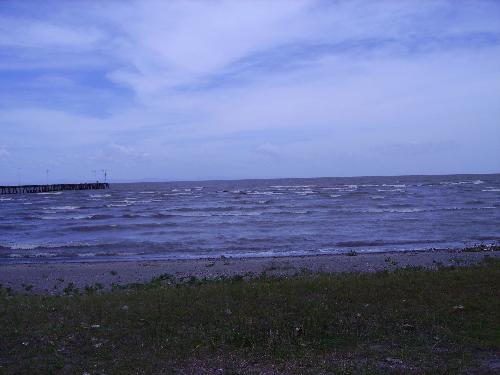 Beach at Granada, Nicaragua - A view of the water at Granada, Nicaragua on a rainy day.