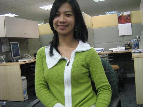 life at the office - i just got a new sweater for christmas! and since i like the green color, it's double the pleasure:P