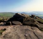 Kinder Scout - The tallest mountain in Derbyshire - I climbed this mountain on my 10th birthday. Whilst it's not a big mountain, it's very famous in England, for a 'Mass Trespass' which happened in 1932. Ramblers were forbidden by law from hiking on certain mountains, and were campaigning to be allowed to enjoy hiking in this and other beautiful places in England. This was a form of protest, and the land-owner's men and the police tried to stop them, and several people were arrested. Nowadays hikers have a lot more rights, and climbing Kinder Scout is allowed again.