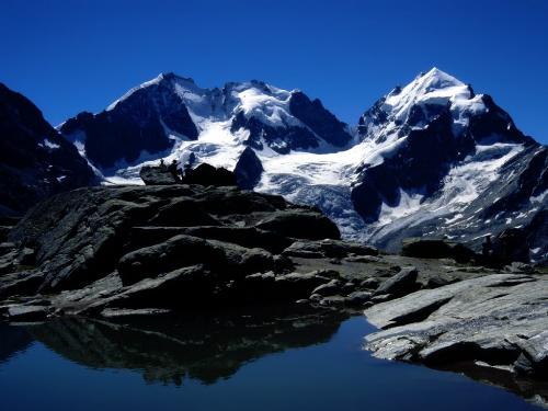 Switzerland - Piz Bernina on the left with Biancograt and Piz Roseg Switzerland Grisons