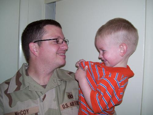 My husband and my son - My husband getting ready to leave for Saudi for 6 months :(