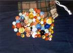 Marbles and Pouch - A selection of marbles and a carrying pouch to put them in.