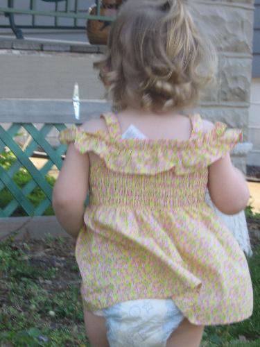 My daughter playing outside - There is just something priceless about this picture. I love it. Its just so adorable!