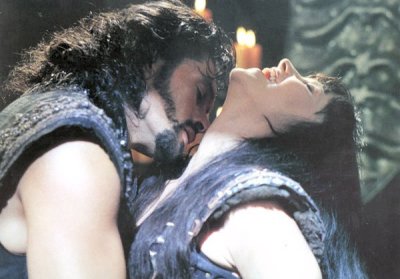 Xena and Ares - Image of Ares kissing Xena from the tv show Xena Warrior Princess