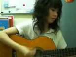 Cute girl - Playing guitar