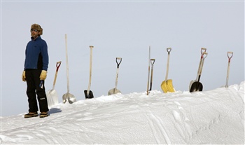 News - Dr Konrad Steffen, Director of the Cooperative Institute for Research in Environmental Sciences (CIRES) at the University of Colorado, stands next to a row of snow shovels at Swiss Camp research center, 70 km (43 miles) northeast of Ilulissat, May 17, 2007.