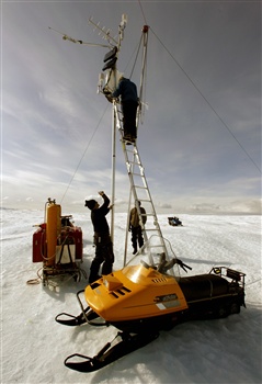 News - Dr Konrad Steffen, Director of the Cooperative Institute for Research in Environmental Sciences (CIRES) at the University of Colorado, climbs a ladder to perform maintenance on a weather station, 70 km (43 miles) northeast of Ilulissat, May 18, 2007