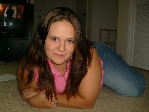 Me - Me in my living room, my husband is having his own photo shoot.