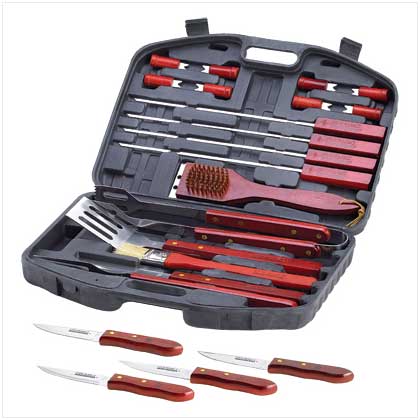 Deluxe Barbecue Tool Set - This is one of the featured items this month. It is an 18 pc set. A full set of durable barbeque tools turns any backyard amateur into a pro.   Sturdy plastic case. Wood and stainless steel construction. NOT dishwasher safe. 17' x 3 1/4' x 12 1/4' high.