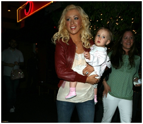 chrissy - christina looking thrilled while holding jordan's niece
