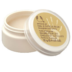 Almond nail & Curticle Balm - This powerful little potion banishes dryness , helps heal cuticles, and prevents splitting so nails look their best, with or without polish. Packed with Community Trade moisturisers.