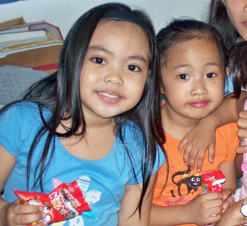 my niece and daughter - picture of my very beautiful niece wearing a blue blouse and my very cute daughter my niece and daughter - picture of my very beautiful niece wearing a blue blouse and my very cute daughter