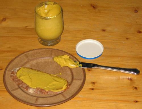 bread with mustard - a thick paste from mustard seeds used as condiment
