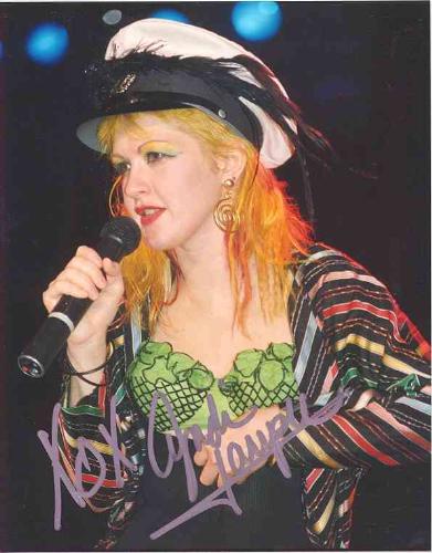 Cyndi Lauper - Cyndi Lauper is an iconic Grammy Award-winning singer and Emmy Award-winning film, television and theatre actress. Her melodic voice and wild costumes have come to epitomize the 1980s and New Wave — the decade and genre in which she first came to fame.