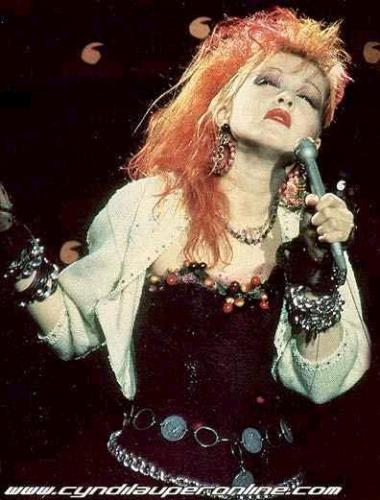 Cyndi Lauper - Cyndi Lauper is an iconic Grammy Award-winning singer and Emmy Award-winning film, television and theatre actress. Her melodic voice and wild costumes have come to epitomize the 1980s and New Wave — the decade and genre in which she first came to fame.