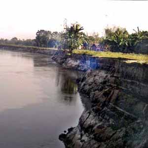 Erosion - Erosion by the Brahmaputra has gobbled up large tracts of land in Chhaygaon area, Asom, India.
