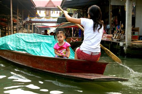 Thailand - Thailand is home to several distinct geographic regions, partly corresponding to the provincial groups. The north of the country is mountainous, with the highest point being Doi Inthanon at 2,576 metres (8,451 ft). The northeast consists of the Khorat Plateau, bordered to the east by the Mekong river. The centre of the country is dominated by the predominantly flat Chao Phraya river valley, which runs into the Gulf of Thailand. The south consists of the narrow Kra Isthmus that widens into the Malay Peninsula.