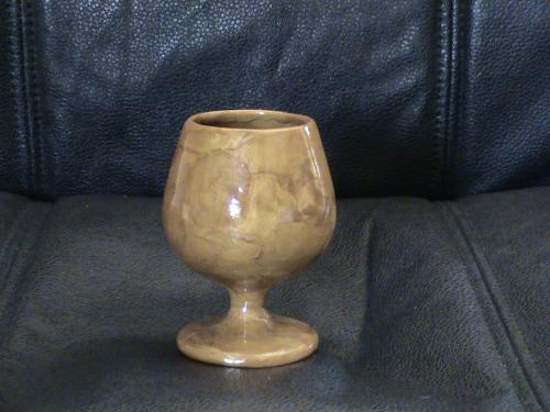 bud vase - this is a glass vessel covered in gold polymer clay and glazed to a high shine.