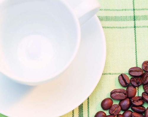 A cup waiting - the coffee beans turn to a coffee ...