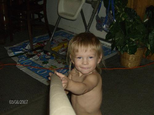 My 2 Yr. Old Tyler - This is Tyler. He is going through the terrible 2's and driving my nuts...lol He was trying to hit the camera with a cardboard from wrapping paper. He's a little pill!