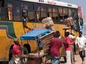 Vendors near buses selling items - vendors Vendors near buses selling items - vendors