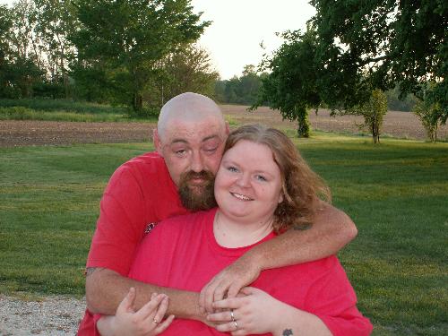 me and my honey - this is me and my husband of 11 and a half years, alan! our neice and her family were moving to georgia the next day and we attended a going away party for them. i am a freelance photographer....always on the other side of the camera, you can't even tell i attend parties or family get togethers!!! i was able to have our nephew, timothy take this photo of alan and i together! i have let him mess around with my camera here and there to get the feel of it so he can get some shots of me once in a while! i think he's getting pretty good....don't you?  i love this photo of us jsut because we don't really have to many of us together even though we have been together for so many years!!!
