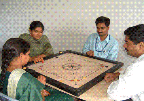 Caram - People playing Caram